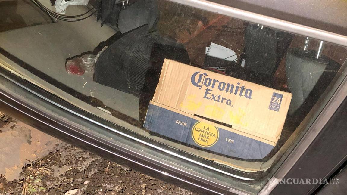 $!Se encontró cerveza dentro del auto.