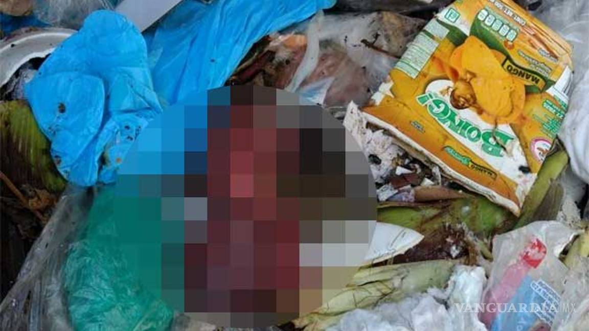 $!Hallan feto en camión de basura de CDMX
