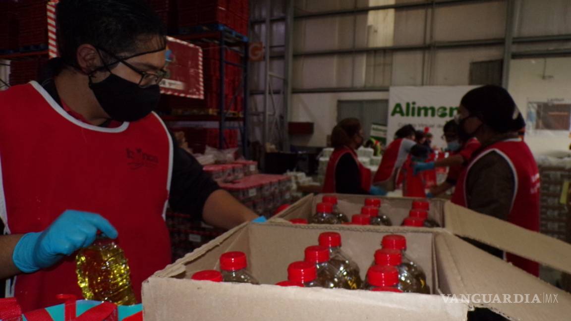$!Sin posada por COVID; pero con despensa y bolo, manos a la obra en el Banco de Alimentos