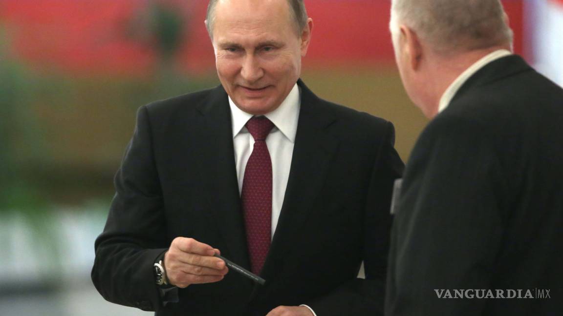 Vladimir Putin va por su cuarto mandato en Rusia con más del 70% de los votos