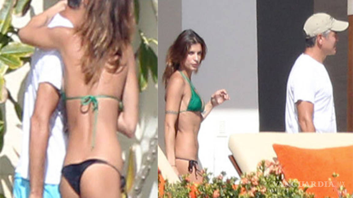 Elisabetta Canalis's bikini reveals a little too much as she emerges from  sea in Mexico