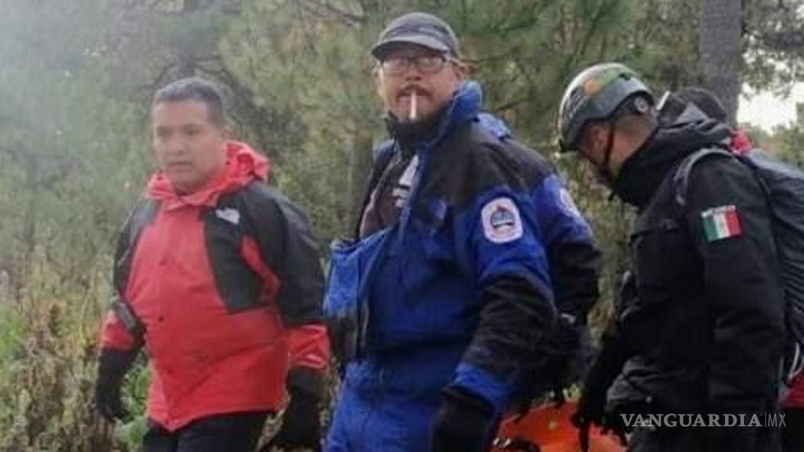 $!El cuerpo de la mujer fue traslado esta mañana a la parte baja de la montaña, donde iniciaron las investigaciones correspondientes.