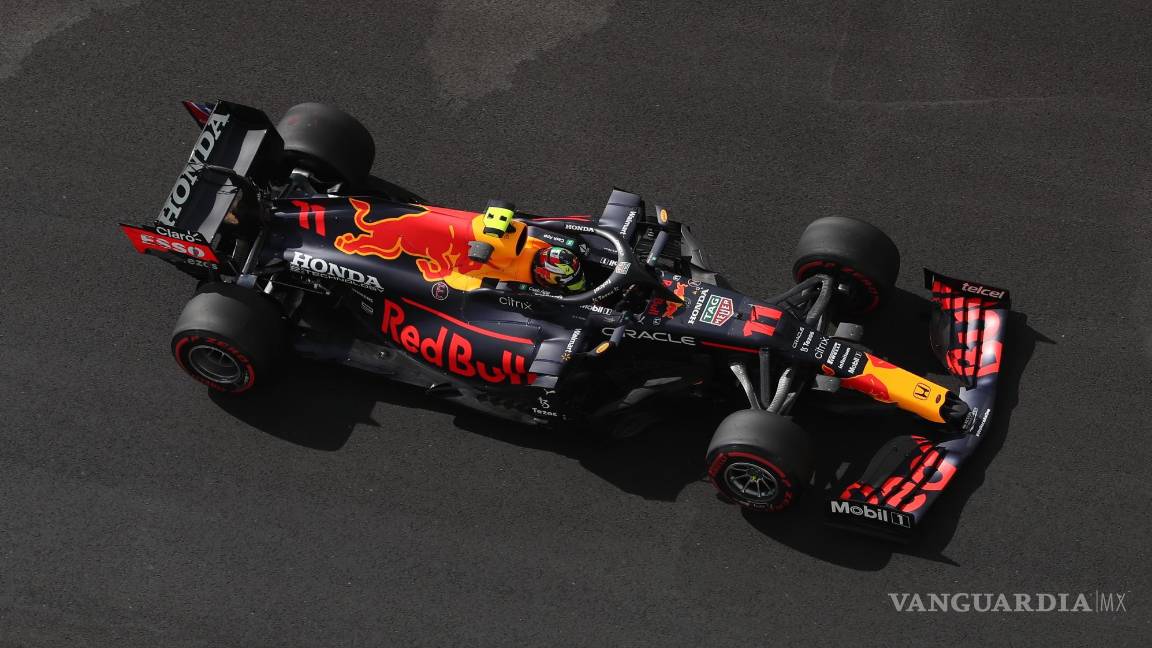 $![Abu Dhabi (United Arab Emirates), 10/12/2021.- Mexican Formula One driver Sergio Perez of Red Bull]