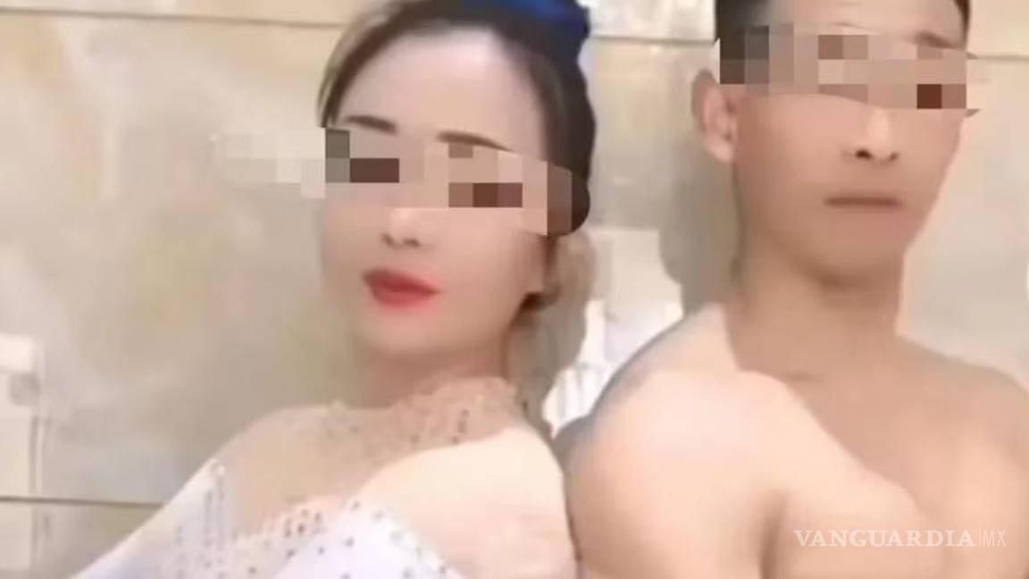 $!Sun Moumou junto a su marido Zhang Moumou