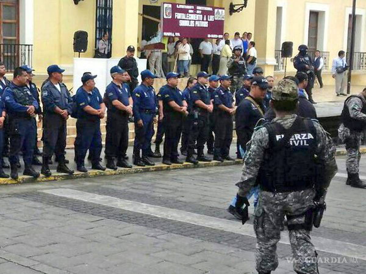 $!Suman 8 policías de Papantla detenidos por desaparición de 3 jóvenes