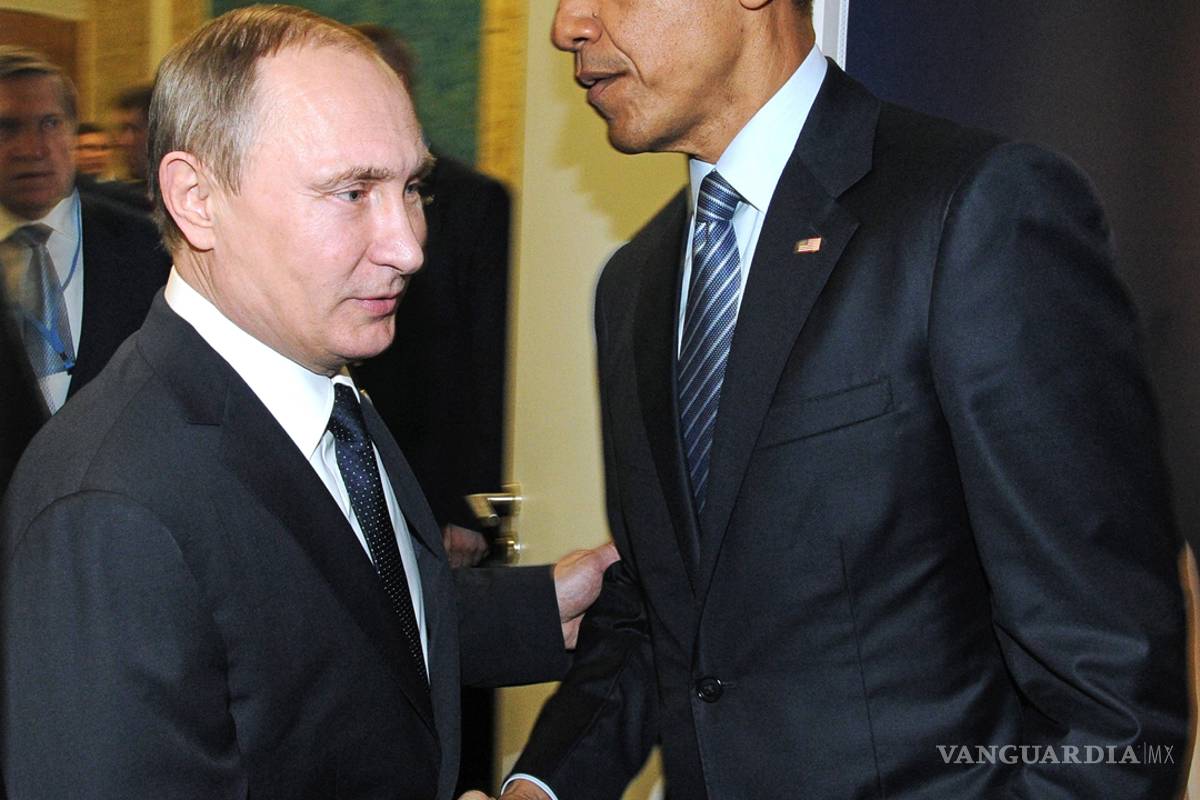Putin y Obama se reúnen a puerta cerrada en París