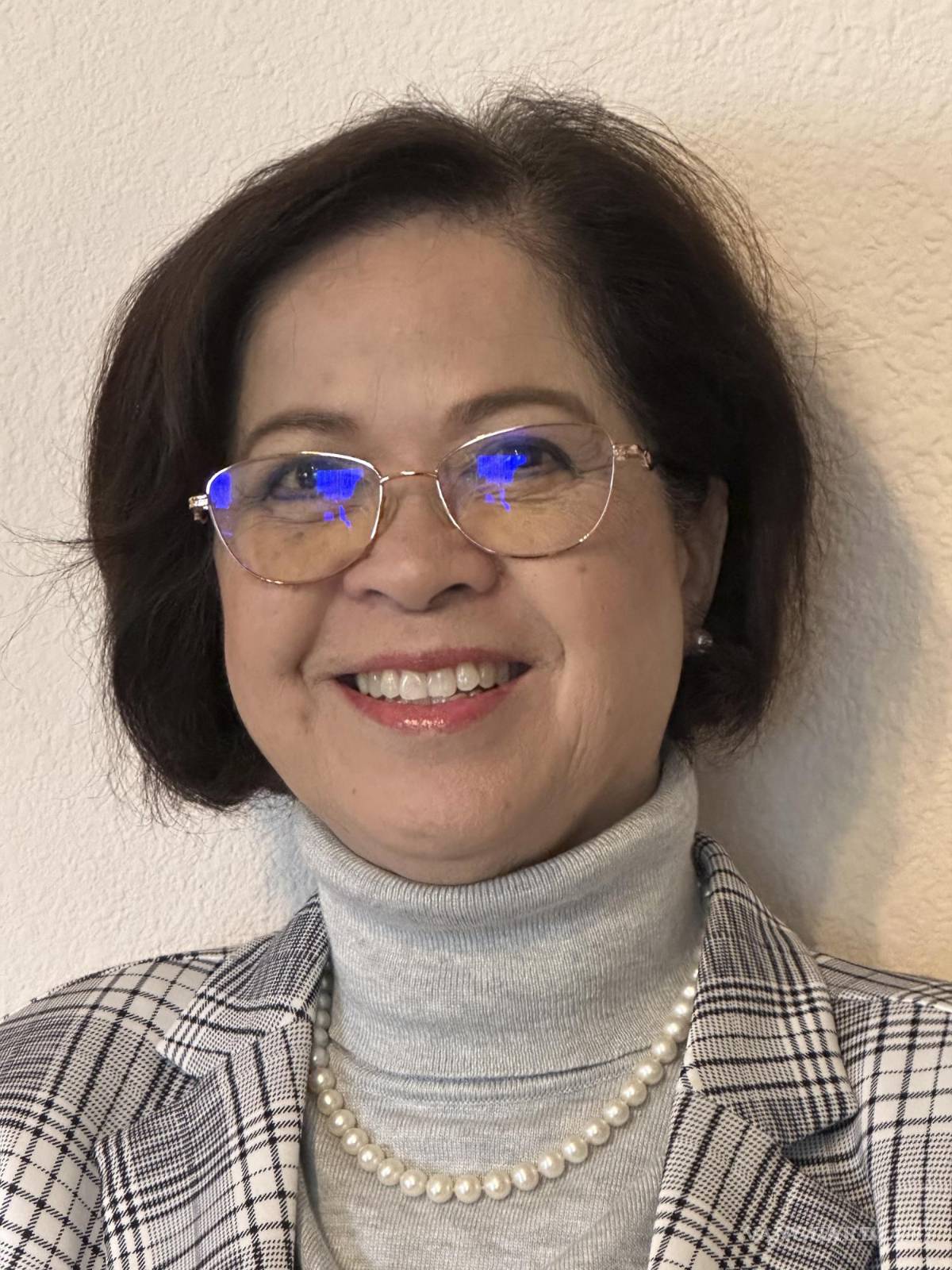 $!Kim-Trang Dang en su casa de San Diego. Era una estudiante de derecho de 25 años que trabajaba como profesora cuando dejó Vietnam.