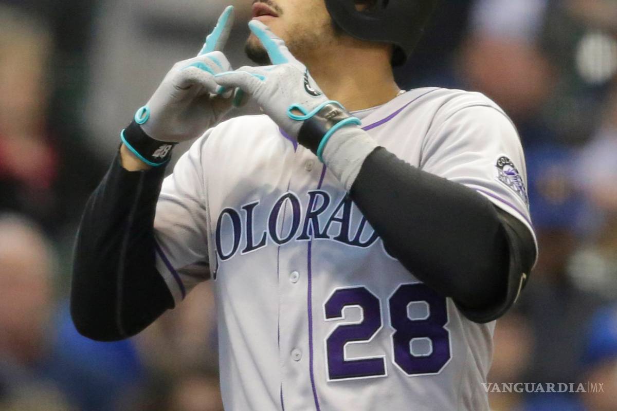 Los Rockies ligan su triunfo 12 de 17 juegos consecutivos para vencer a los Cerveceros