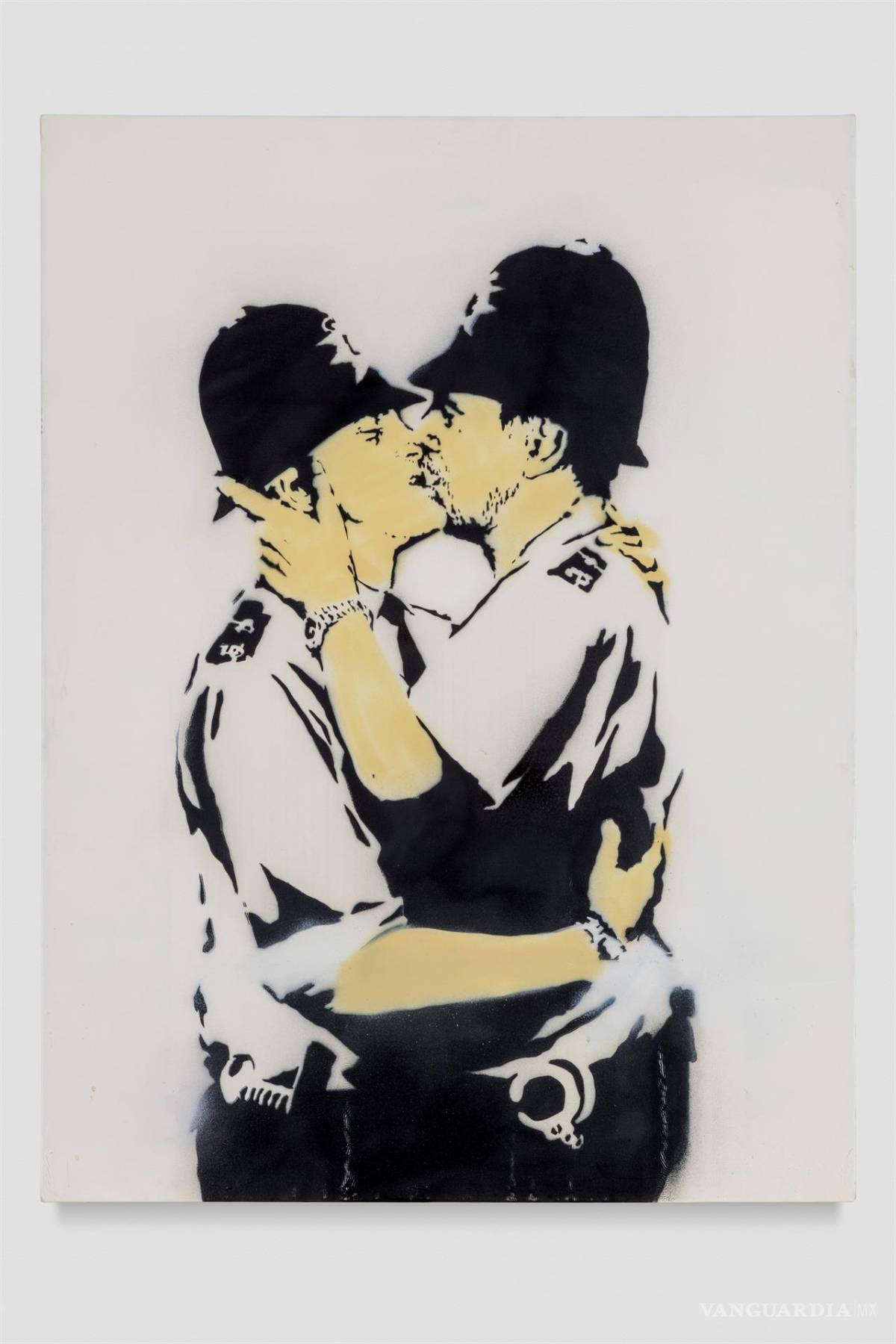 $!Fotografía de la obra “Kissing Coopers” del artista británico Banksy. EFE/Joshua White/Sotheby’s