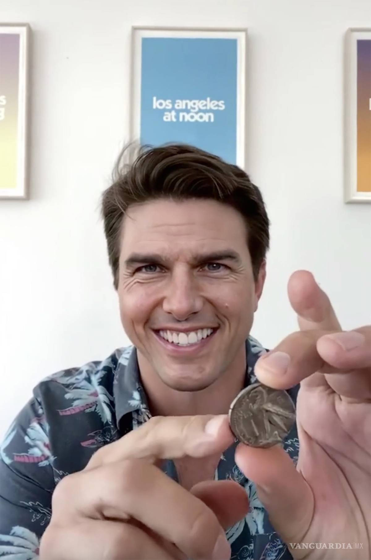 $!Fotograma de un ‘deepfake’ (video falso) en el que Tom Cruise hace un truco con una moneda.