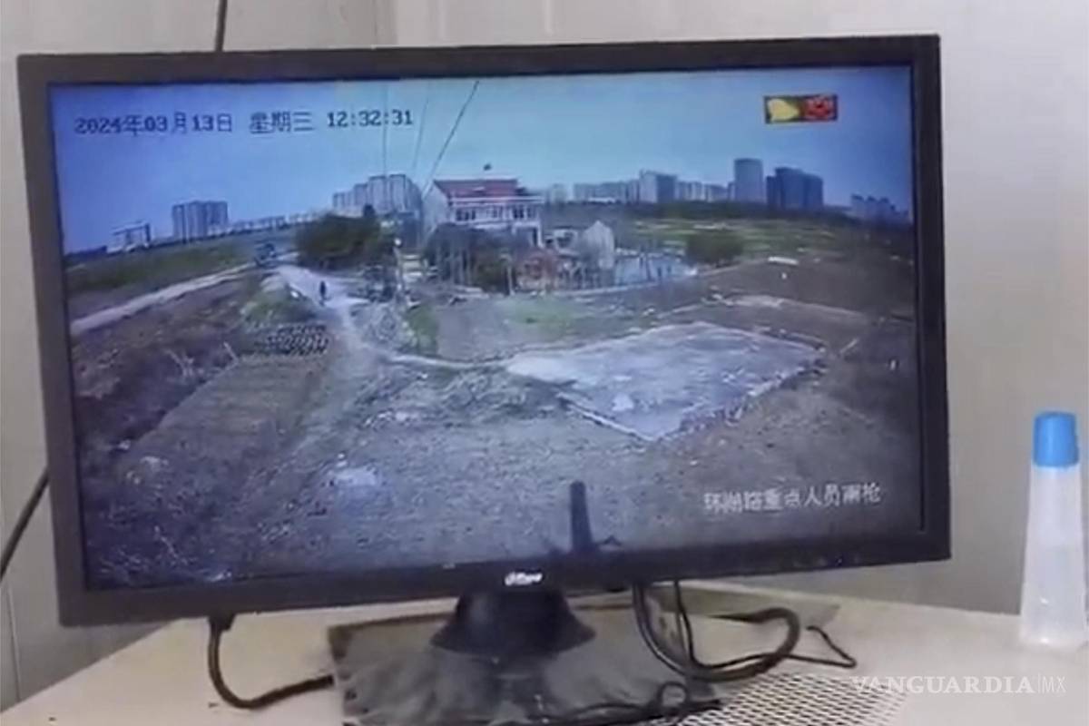 $!Una pantalla muestra la vigilancia de la casa Yang desde un puesto policial al otro lado de la calle en Changzhou, en el este de la provincia oriental china de Jiangsu.