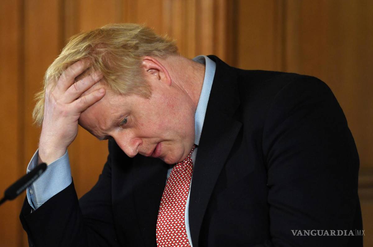 $!El primer ministro británico, Boris Johnson, habla en una conferencia de prensa en el número 10 de Downing Street en Londres, Gran Bretaña, el 12 de marzo de 2020.