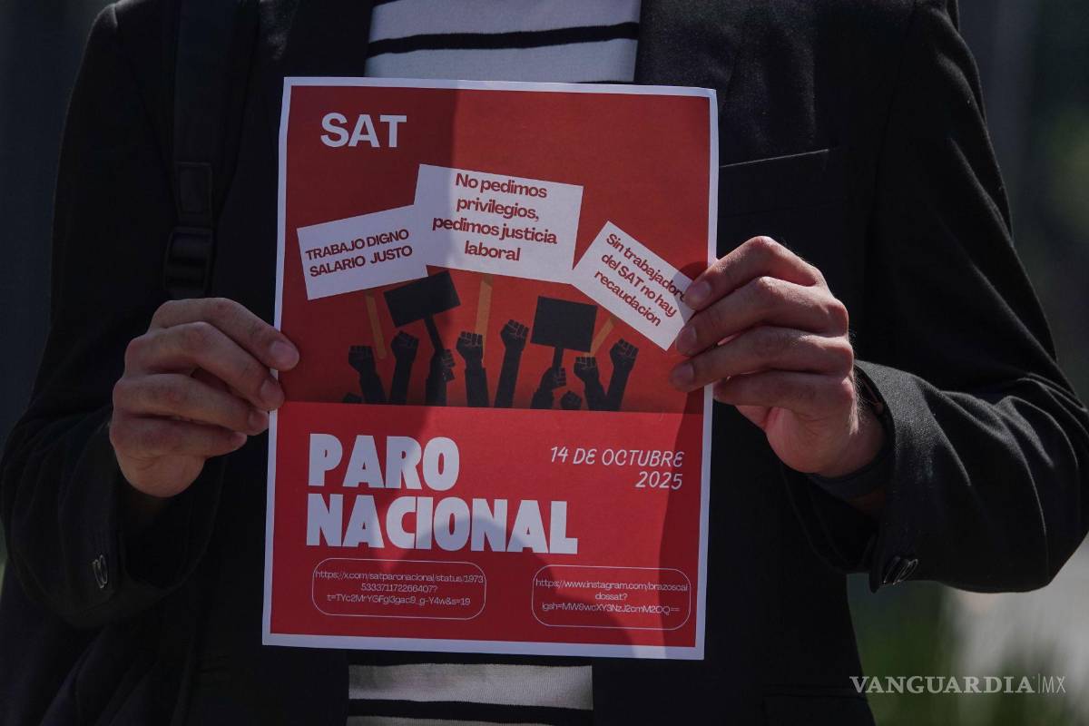 Tras 7 horas de protestas, trabajadores del SAT liberan vialidades