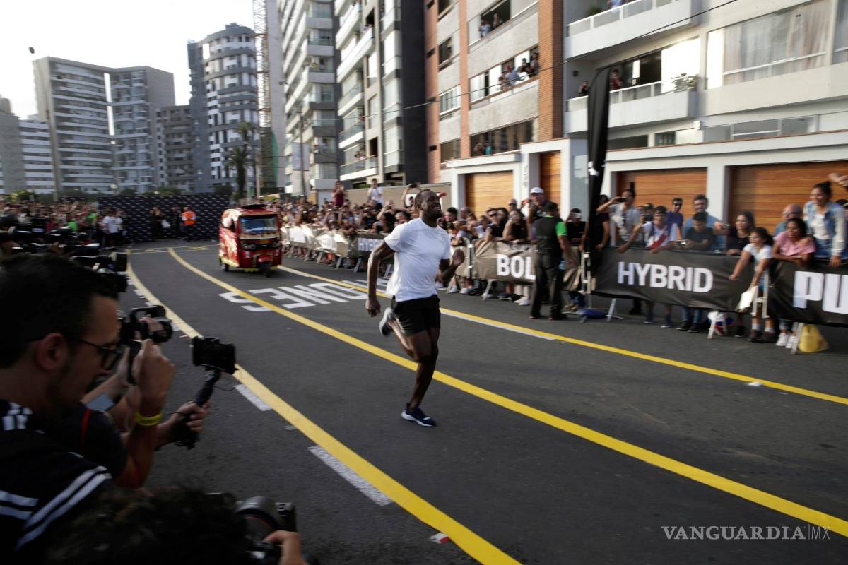 Usain Bolt le gana en una carrera ¡a un mototaxi!
