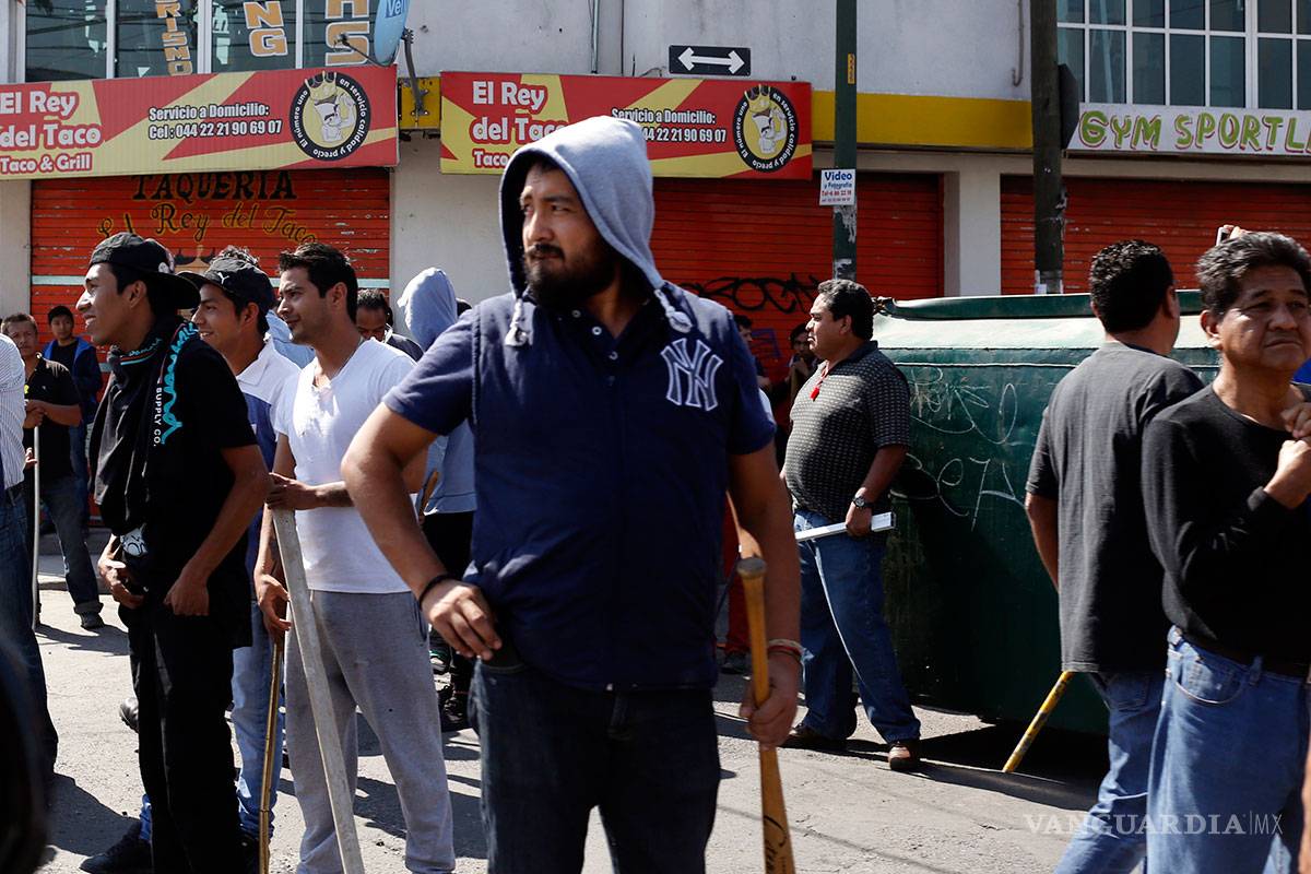 Locatarios se arman para impedir saqueos