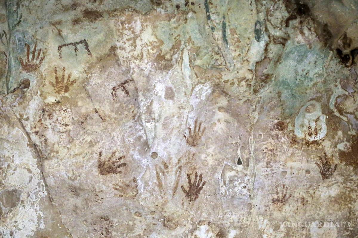 Maravillan a los turistas el legado de los mayas impreso en una pintura rupestre en Yucatán