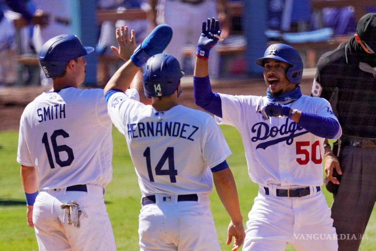 Con jonrones de Pollock y Betts, Dodgers doblegan a los Giants