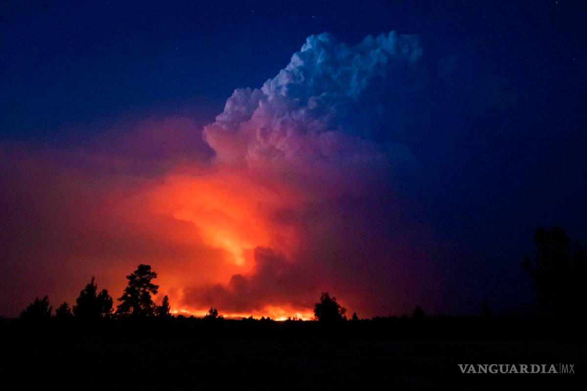 $!Humo de los incendios forestales llegan a ambos extremos de EU