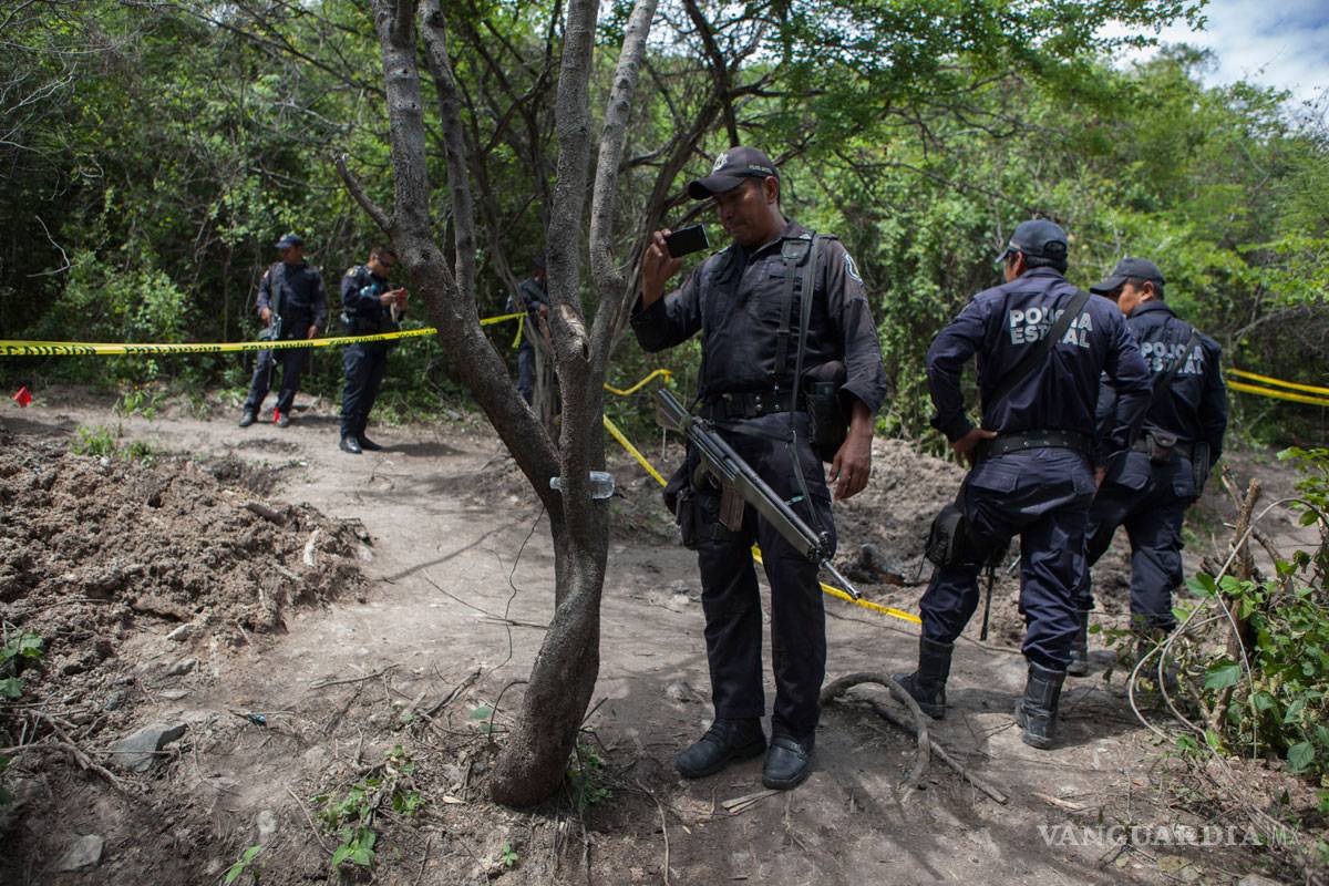 Hallan restos humanos en dos predios de Iguala
