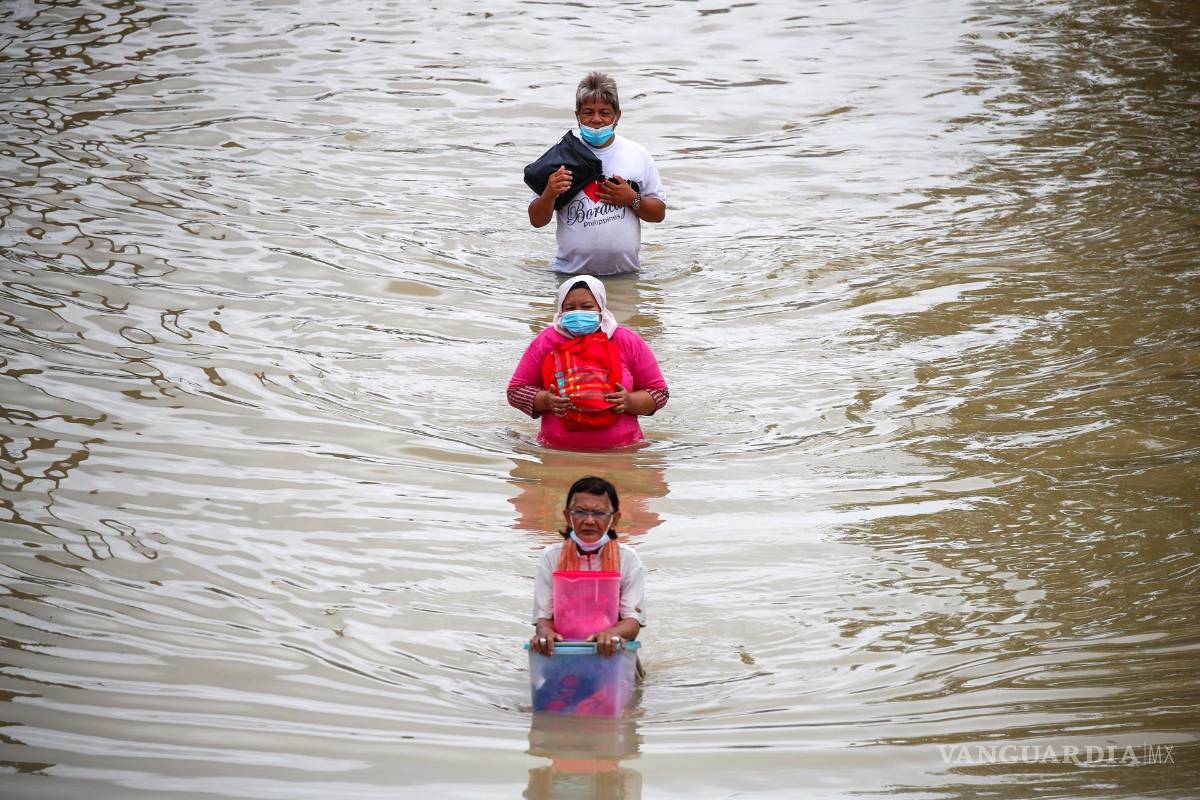 Reportan más de 21 mil evacuados por inundaciones en Malasia