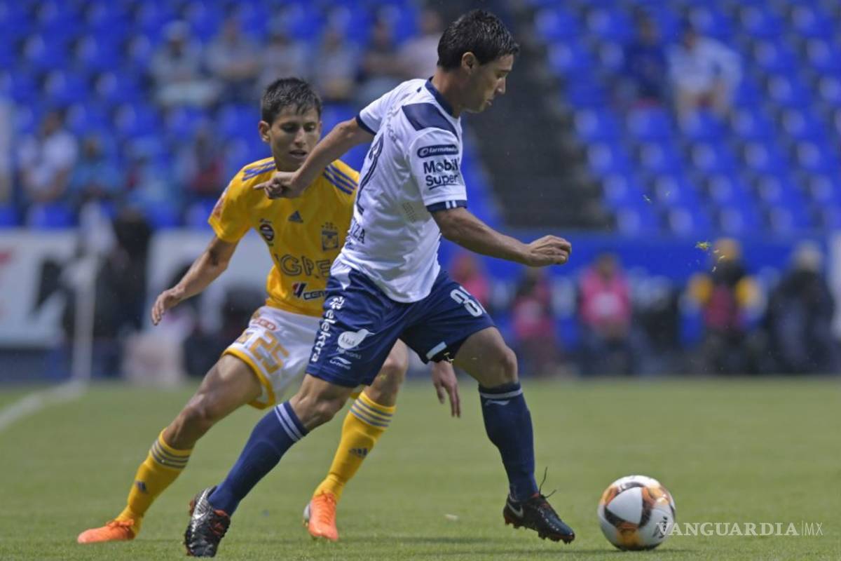 Expulsión de Ferretti y Sánchez Sola protagoniza empate entre Puebla y Tigres