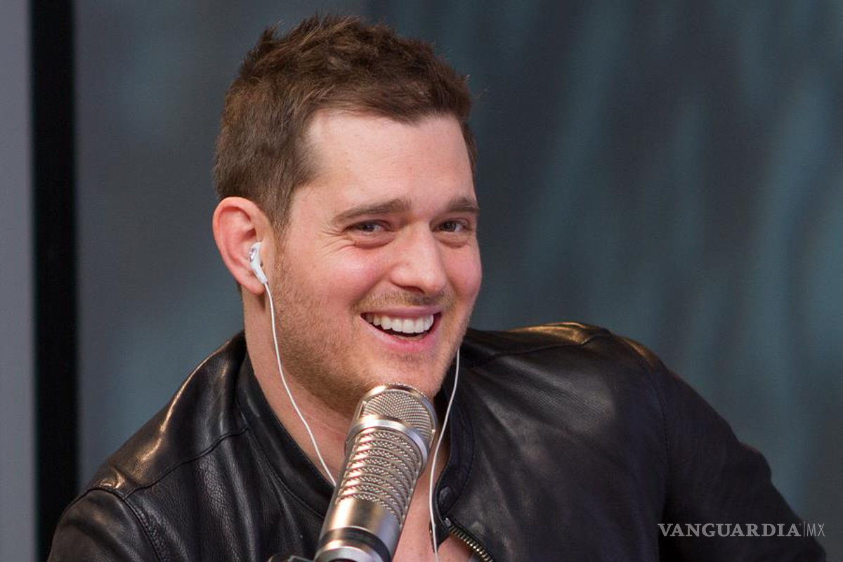 Aconseja Robbie Williams a Michael Bublé sobre paternidad