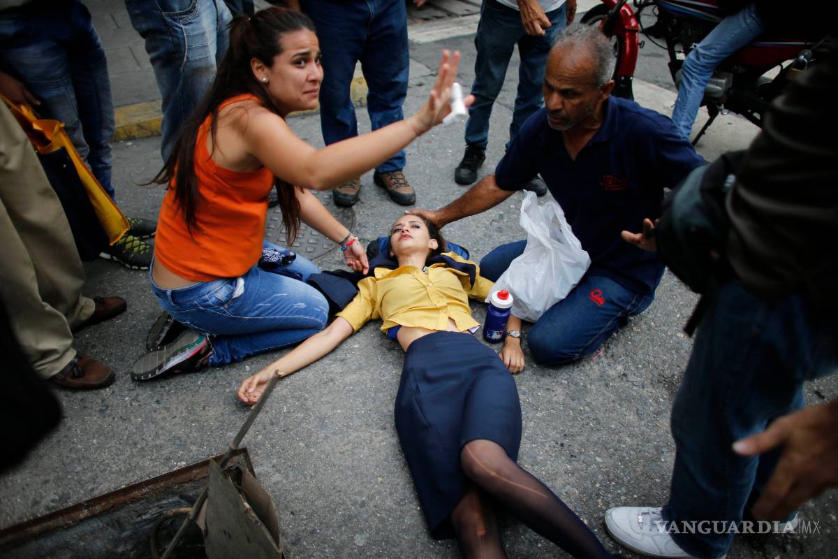 Sube a 21 la cifra de muertos tras protestas en Venezuela
