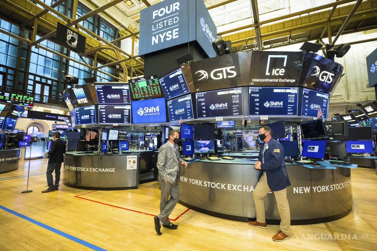Wall Street se olvida de la crisis: Nasdaq cierra en su nivel más alto y S&amp;P 500 borra pérdidas