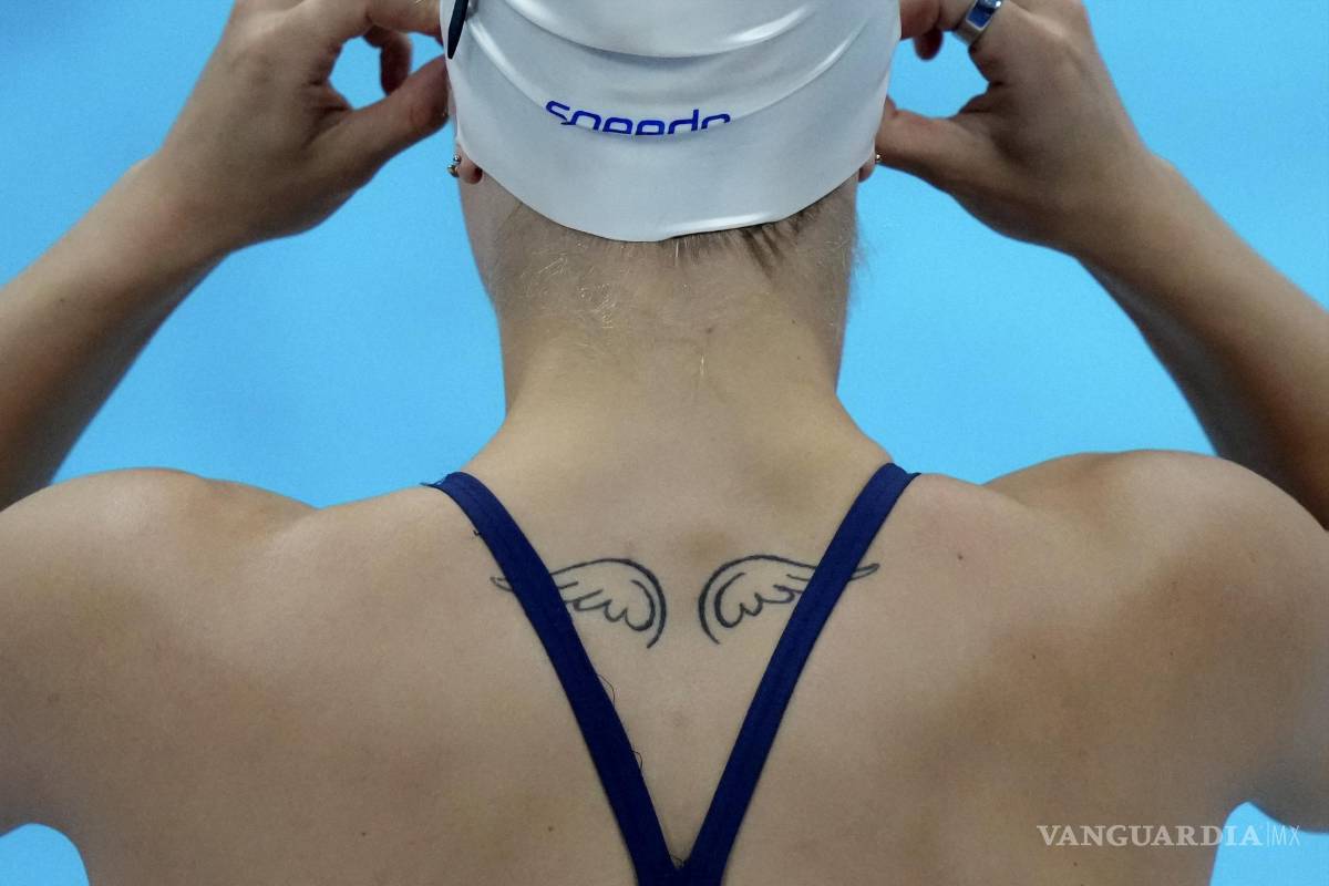 $!Un atleta luce un tatuaje durante una sesión de práctica de buceo en el Centro Acuático de Tokio. (Foto AP / Matthias Schrader)