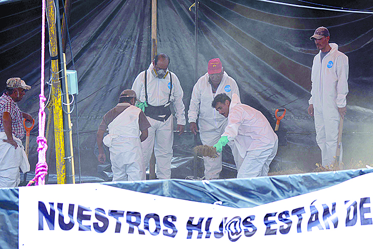 La CNDH atestigua exhumación de restos en fosas de Tetelcingo