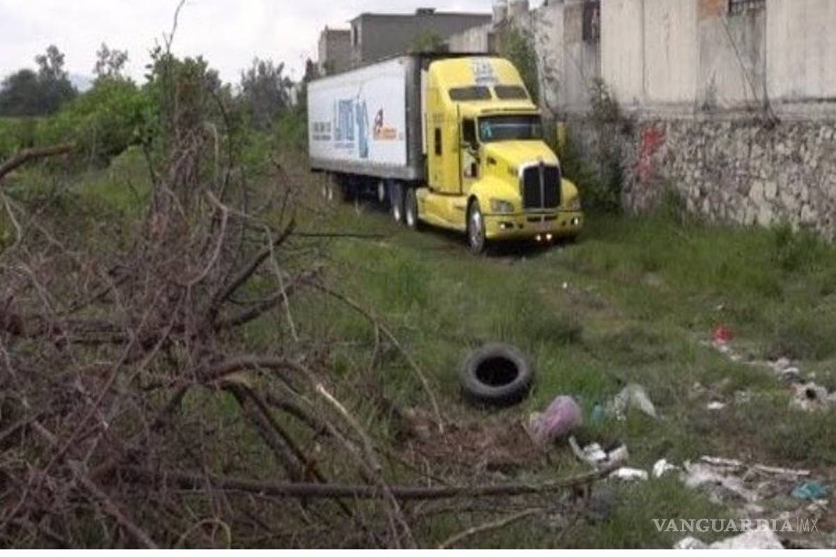 Cesan a director forense de Jalisco por caso del trailer con 157 cuerpos
