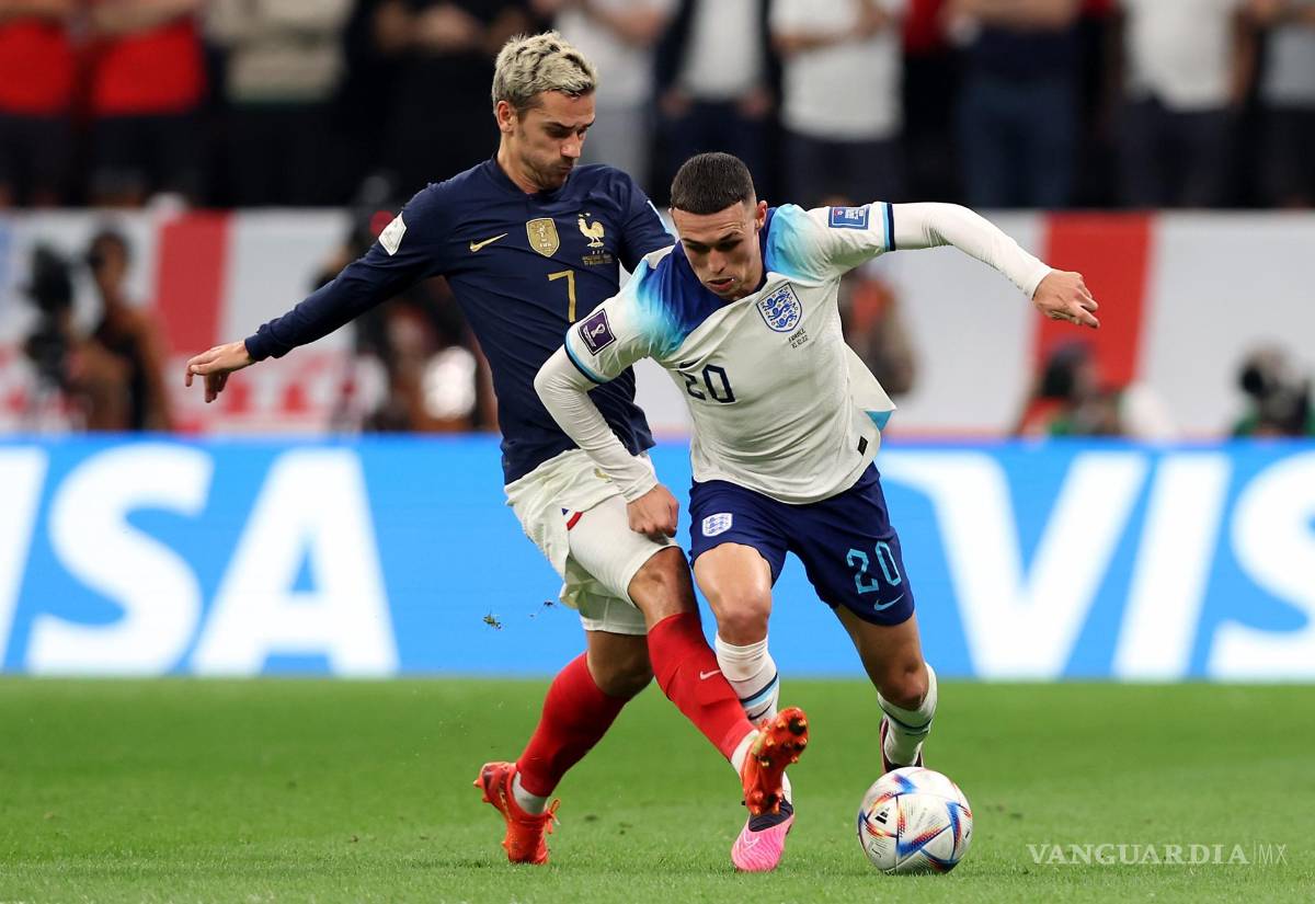 $!Phil Foden en acción contra Griezmann.