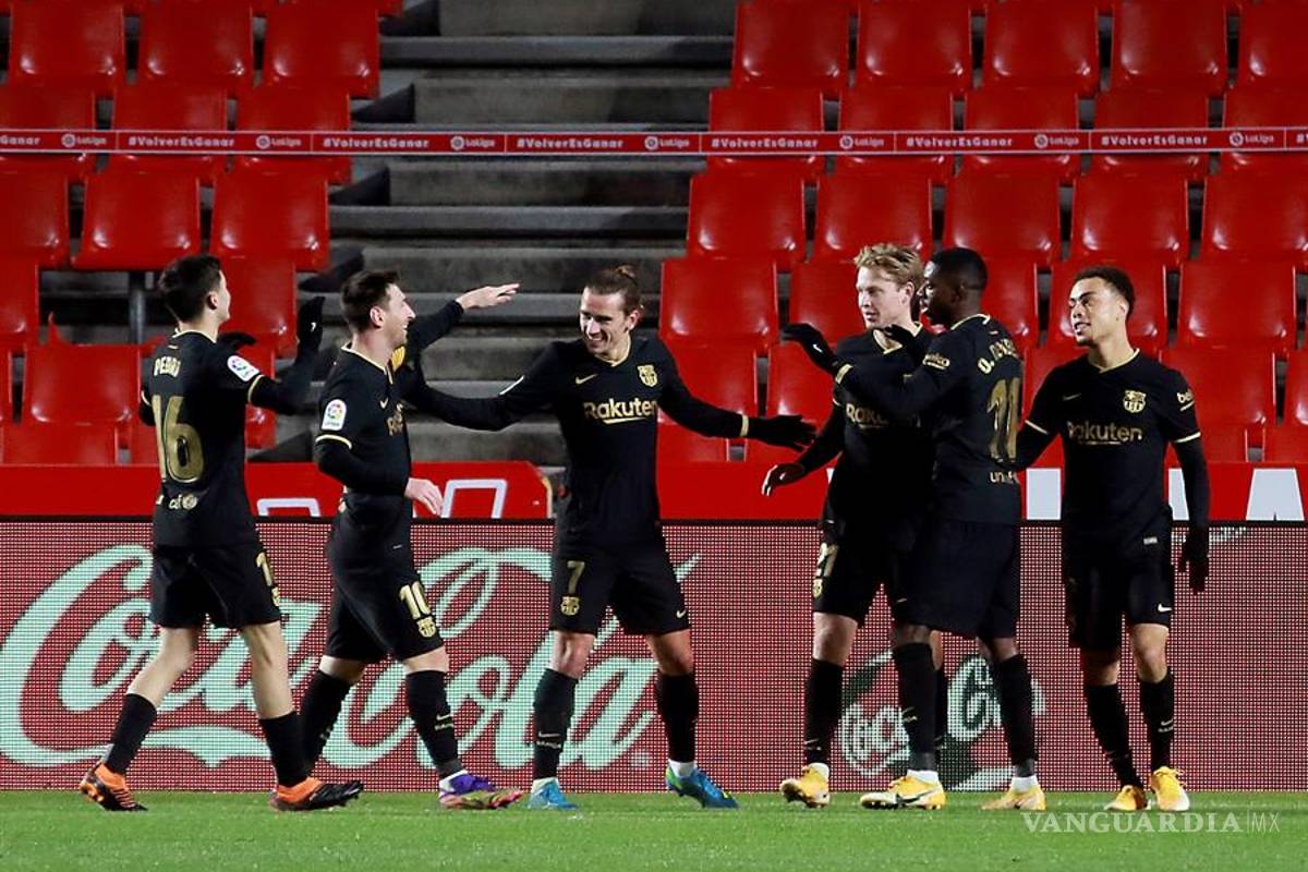 Messi y Griezmann le dan el triunfo al Barcelona