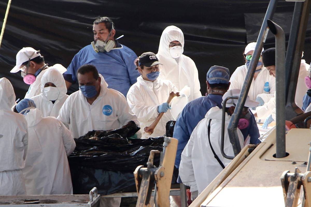 Exhuman el cadáver número 100 en fosa de Tetelcingo