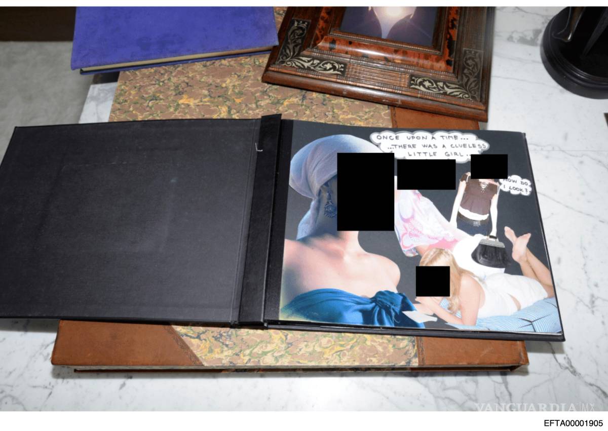 $!Esta foto censurada muestra un álbum de recortes, documentado el 12 de agosto de 2019, durante un registro en la casa de Jeffrey Epstein en la isla Little St. James.