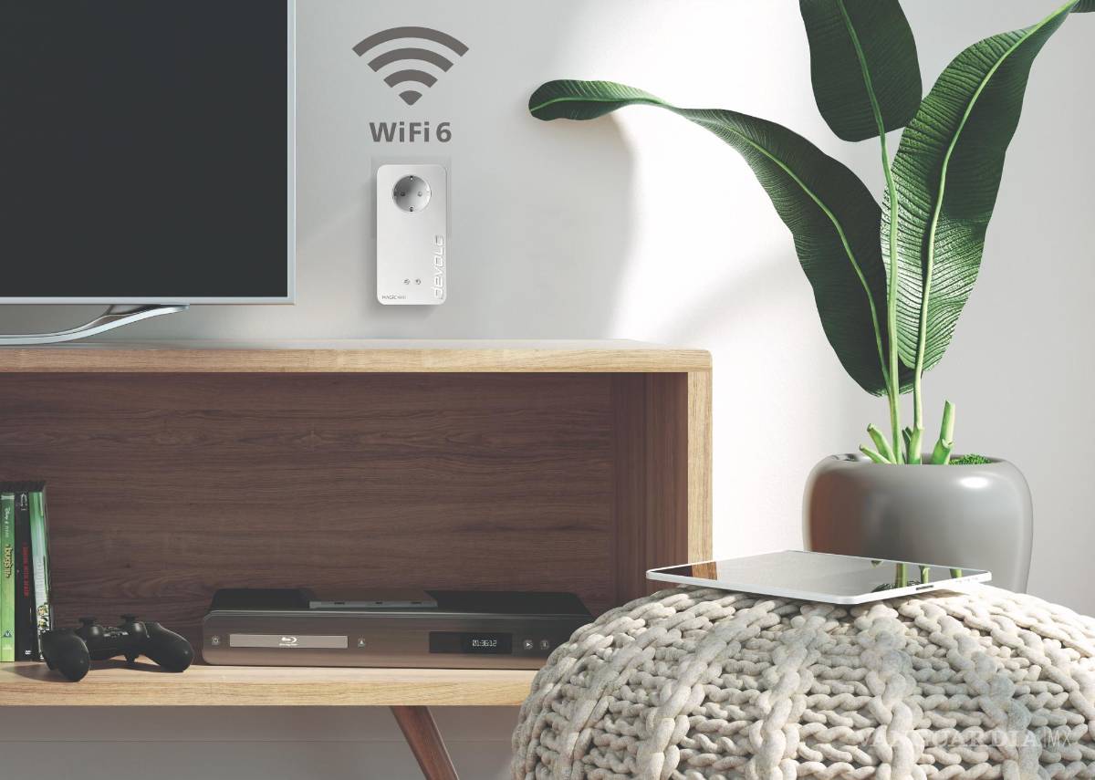 $!Adaptador de red wifi Powerline conectado a red eléctrica.