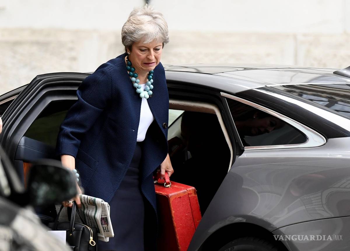 $!80 diputados "tories" se oponen al plan del "brexit"