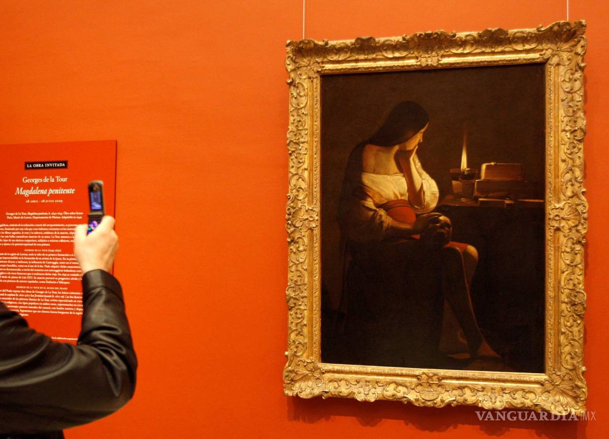 $!La Magdalena penitente de Georges de La Tour que muestra una reflexiva Magdalena estudiando sobre el Señor a través de la lectura y la oración.