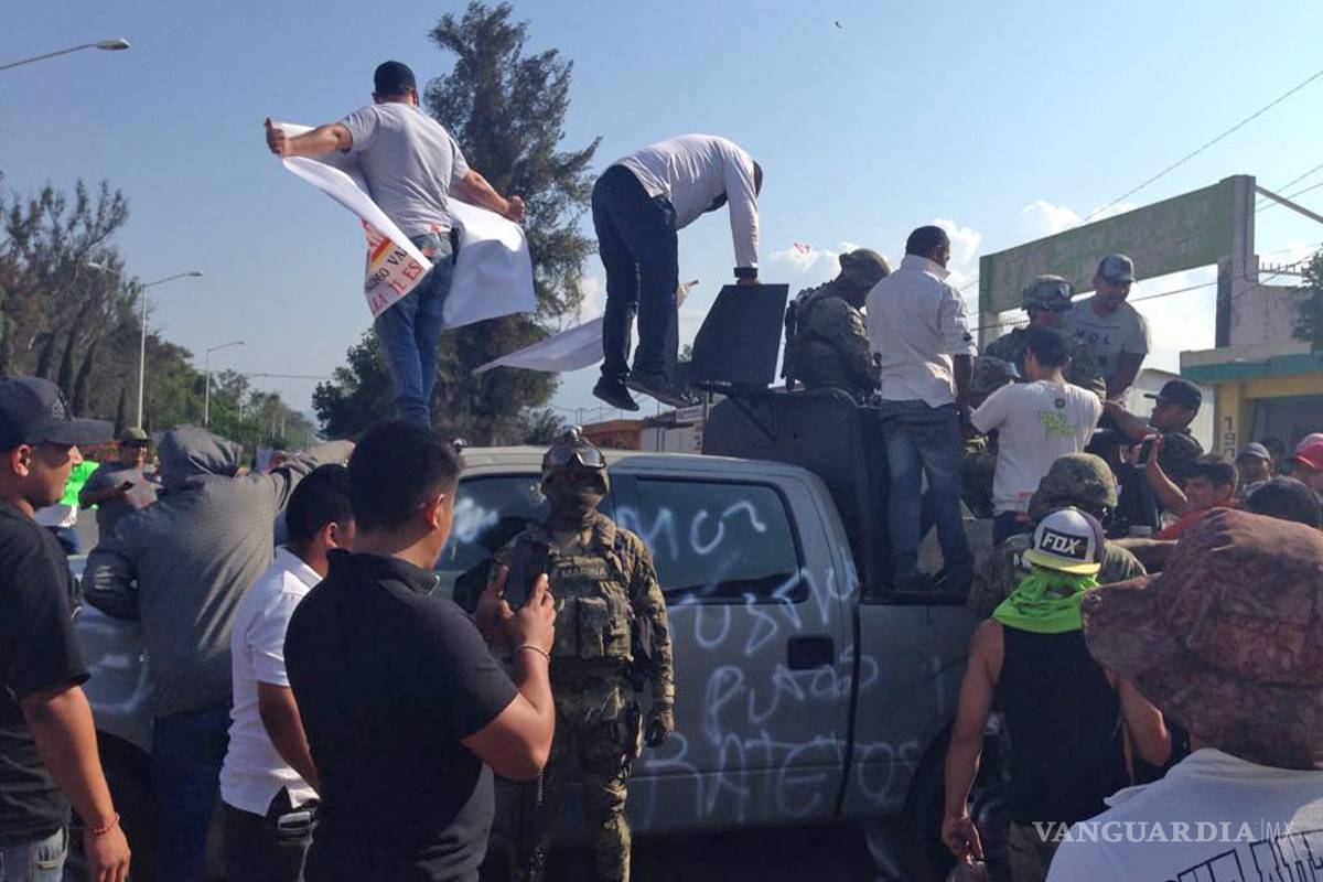 Agreden a marinos en manifestación en Jalisco