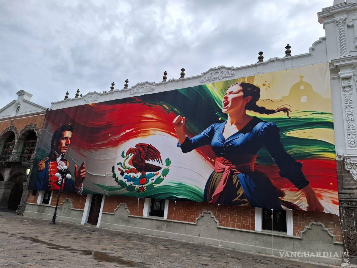 $!Colocan murales patrios en Tlaxcala hechos con IA; exhiben manos con 6 dedos y escudo con águila sin cabeza