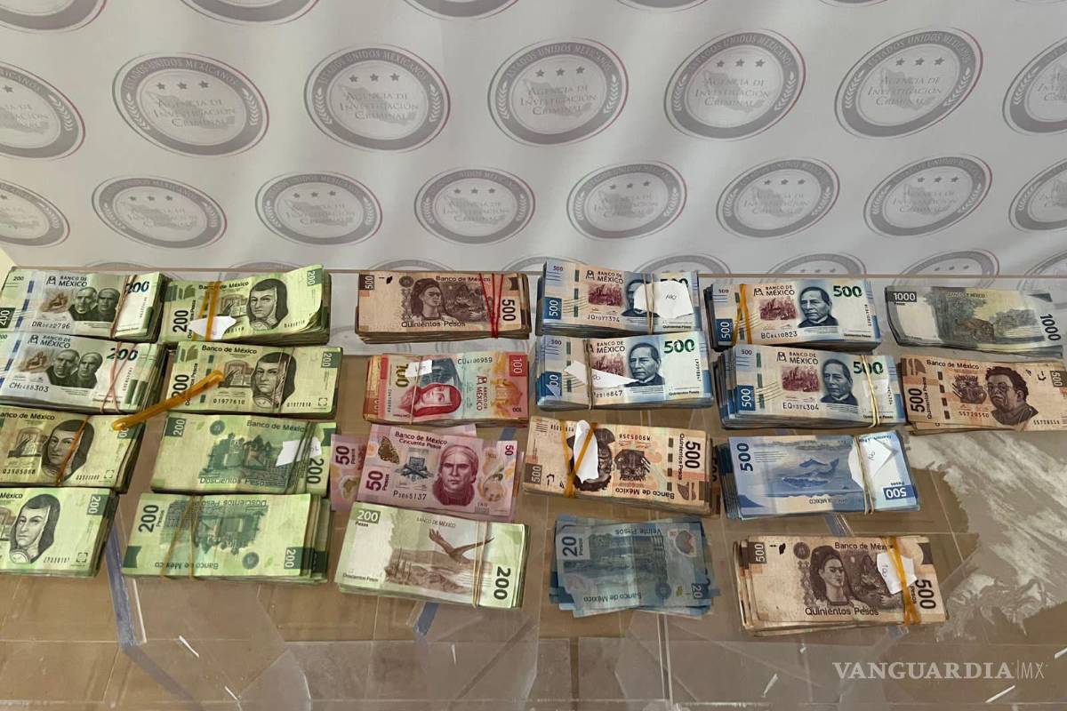 En Nuevo León detienen a dos hombres con más de medio millón de pesos oculto en tractocamión