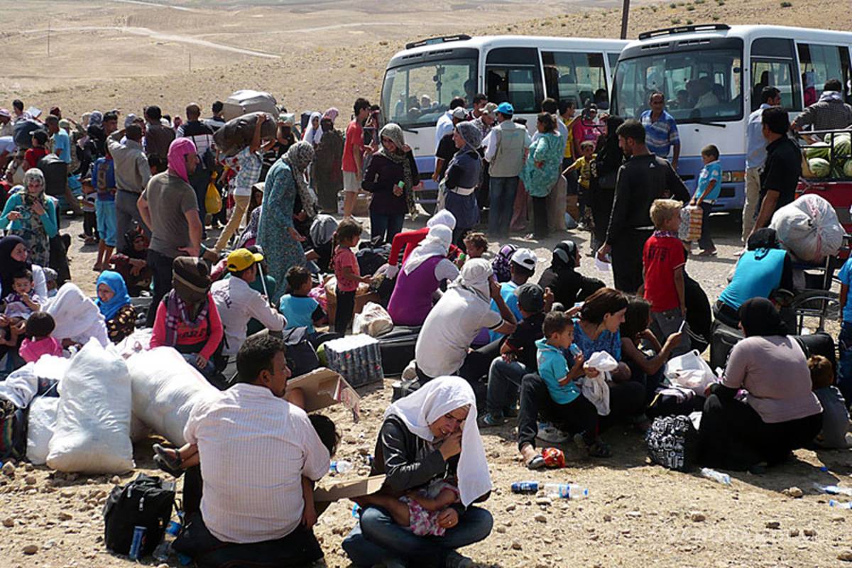 Acuerdan Alemania y Turquía enfrentar crisis de refugiados