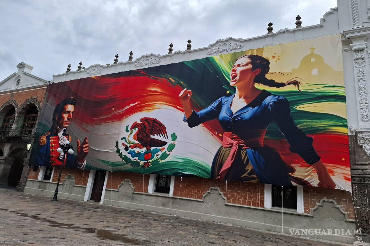 $!Colocan murales patrios en Tlaxcala hechos con IA; exhiben manos con 6 dedos y escudo con águila sin cabeza