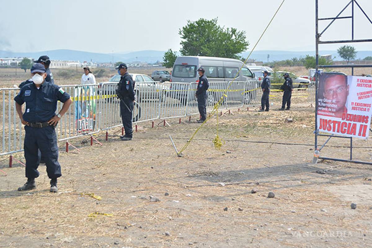 Suman 45 cuerpos exhumados de fosas en Tetelcingo