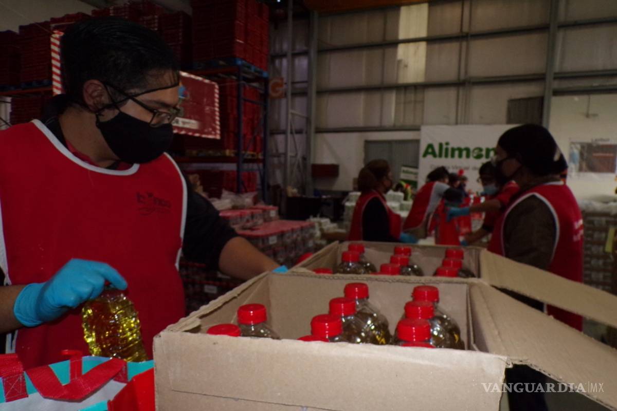 $!Sin posada por COVID; pero con despensa y bolo, manos a la obra en el Banco de Alimentos