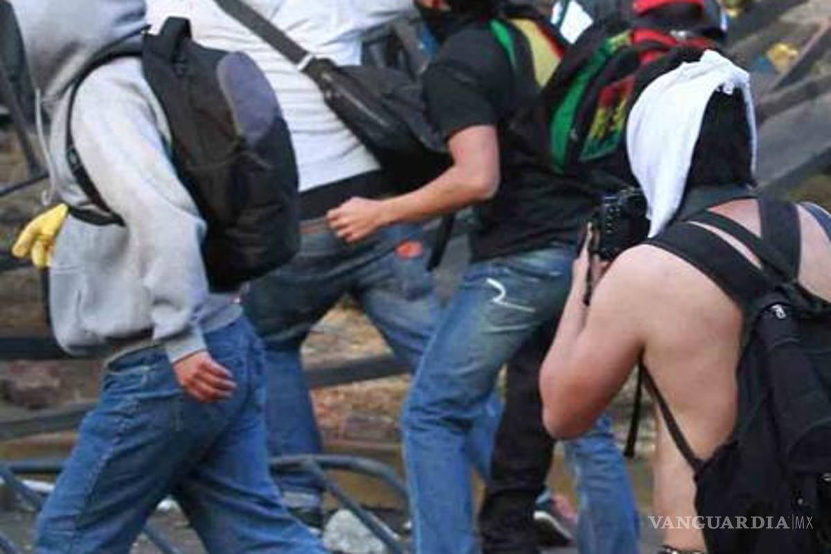 300 pesos, pago para quienes violentaron toma de Peña Nieto