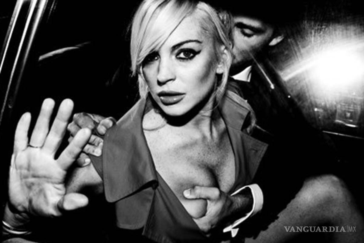 Lindsay Lohan se deja tocar el pecho
