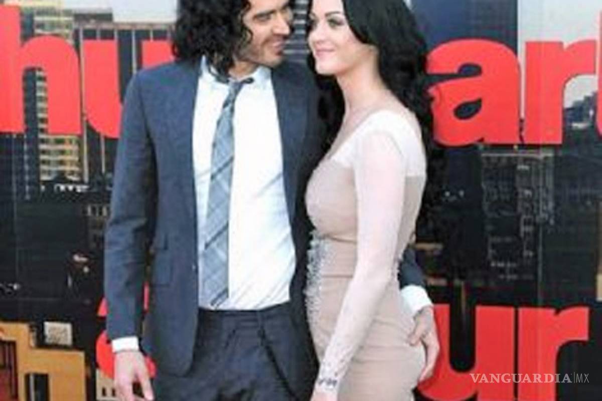 Brand le estruja el trasero a Katy Perry