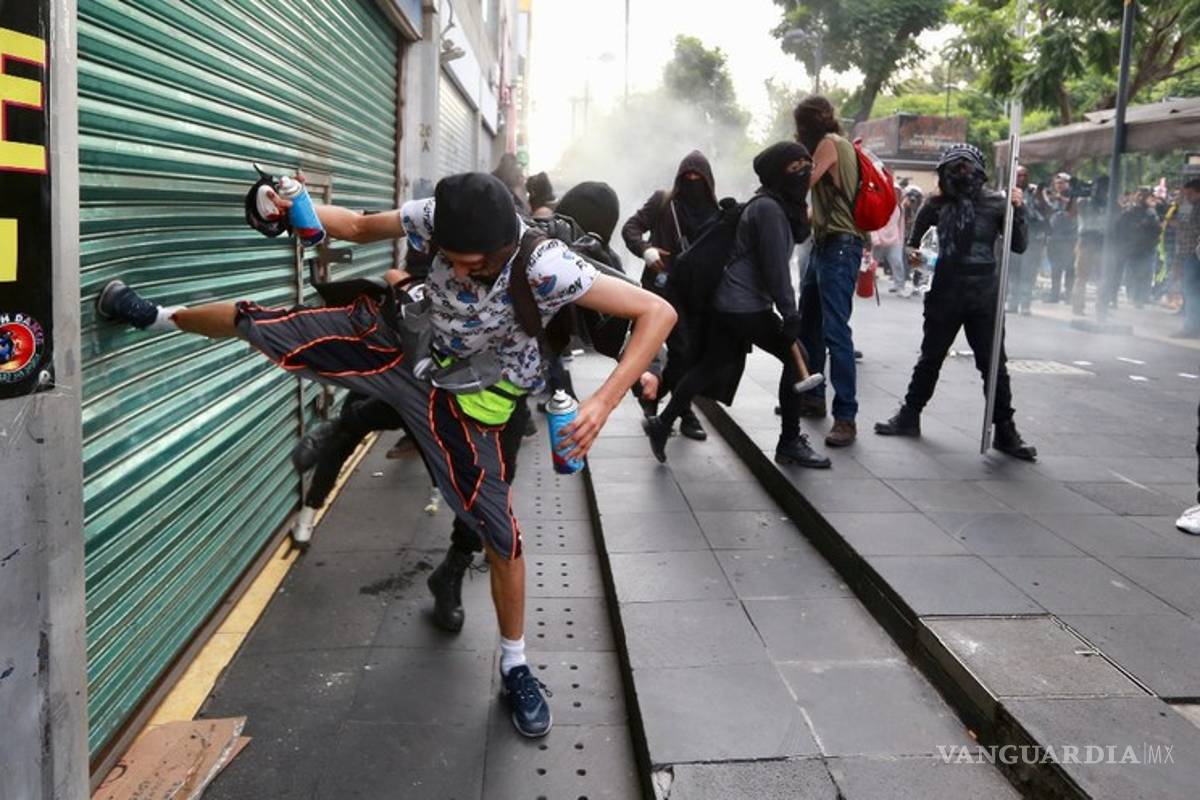 Identificados, vándalos de marcha por los 43 de Ayotzinapa