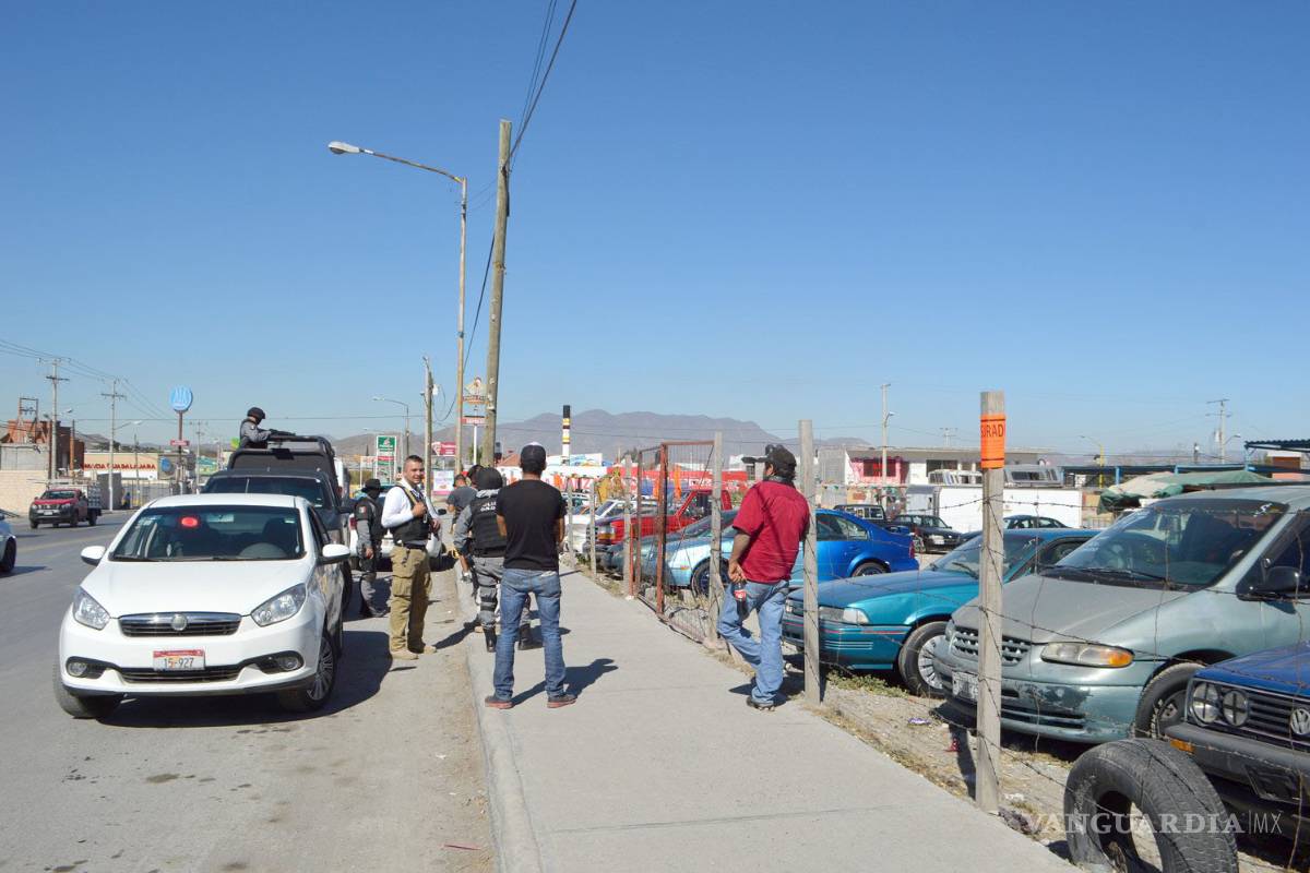 Aparece auto robado al costado de un taller